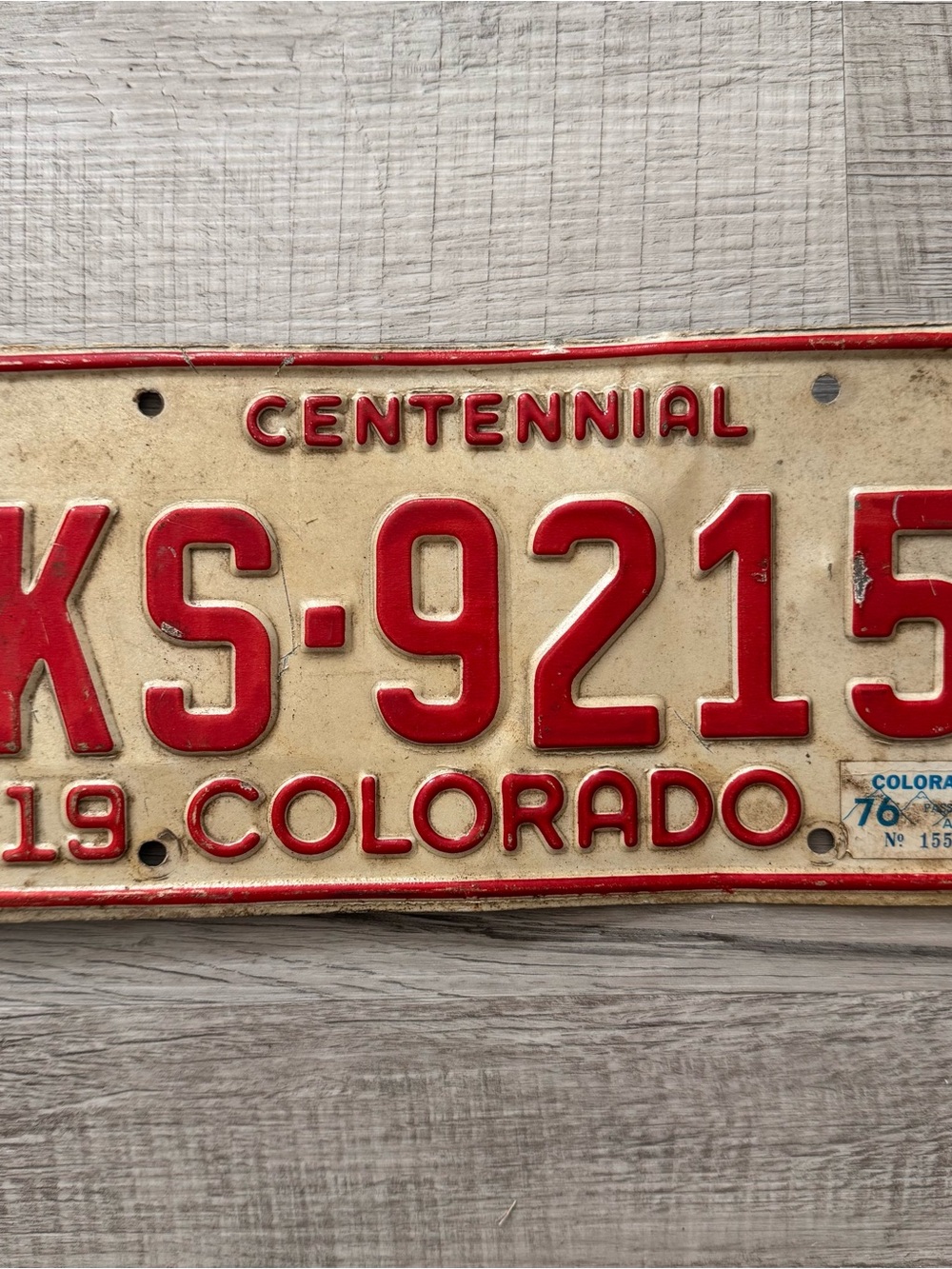 Vintage 1976 COLORADO License Plate Tag Number KS 9215 CENTENNIAL Red And White